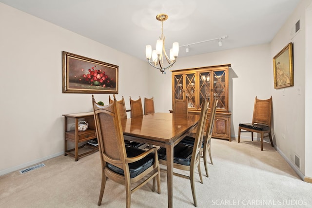 2436 Haider Ave, Naperville, IL 60564 - dining room with a chandelier and light colored carpet