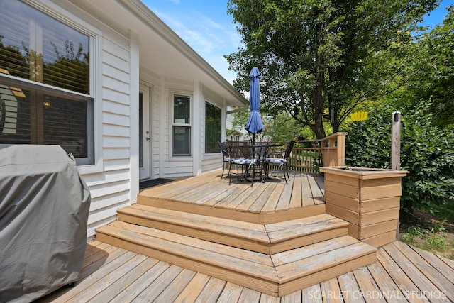 2436 Haider Ave, Naperville, IL 60564 - wooden deck with outdoor dining space and a grill