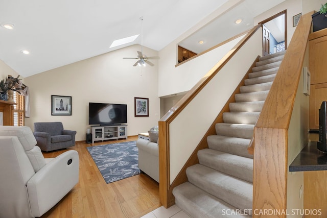 2436 Haider Ave, Naperville, IL 60564 - living area with a skylight, stairs, light wood finished floors, ceiling fan, and recessed lighting