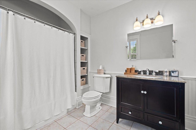 1109 N Dunton Ave, Arlington Heights, IL 60004 - bathroom featuring tile patterned flooring, vanity, and wainscoting