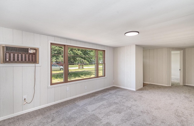16649 W 147th Pl, Lockport, IL 60441 - spare room featuring a wall unit AC, carpet, and wooden walls