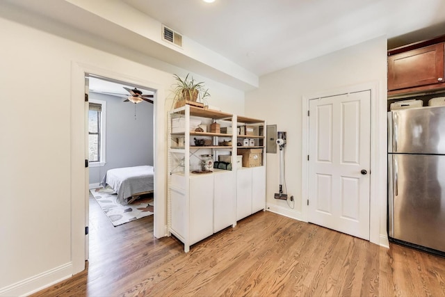 3253 W Palmer St Unit 301, Chicago, IL 60647 - kitchen featuring freestanding refrigerator, light wood-style flooring, and ceiling fan
