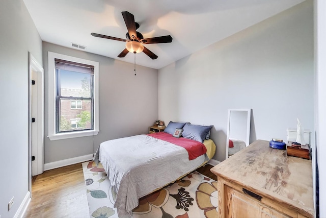 3253 W Palmer St Unit 301, Chicago, IL 60647 - bedroom with light wood finished floors and a ceiling fan
