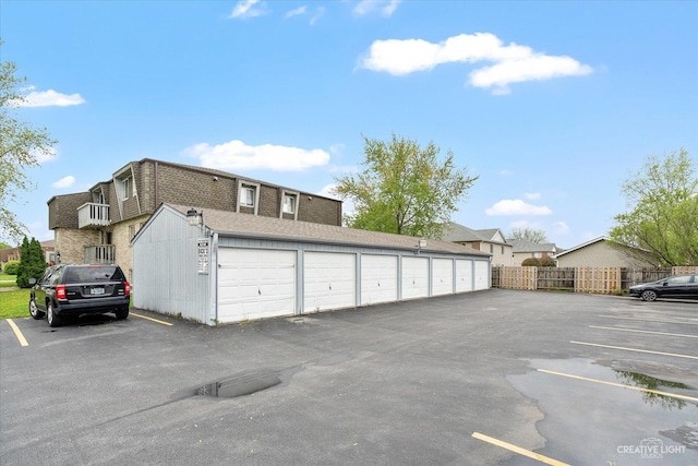 2301 Bicentennial Ave Unit 5, Crest Hill, IL 60403 - uncovered parking lot with community garages