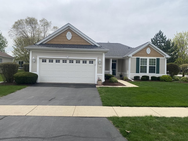 13065 Big Horn Dr, Huntley, IL 60142 - ranch-style home featuring driveway, a front lawn, an attached garage, and roof with shingles