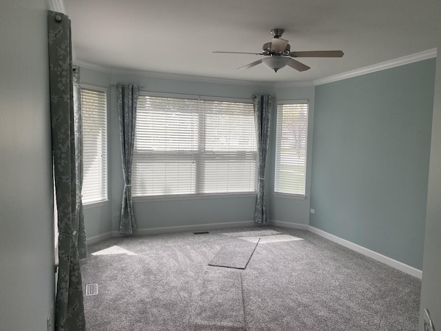 13065 Big Horn Dr, Huntley, IL 60142 - carpeted empty room featuring crown molding and ceiling fan