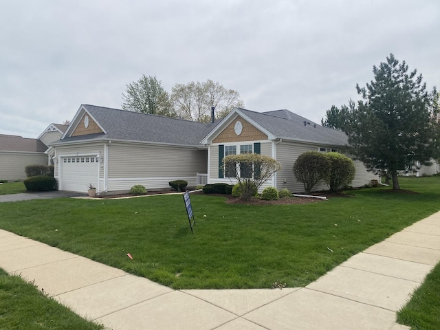 13065 Big Horn Dr, Huntley, IL 60142 - view of front of home featuring a front yard, driveway, and an attached garage
