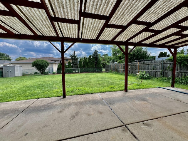 6631 W 89th Pl, Oak Lawn, IL 60453 - fenced backyard featuring a patio area and a storage unit