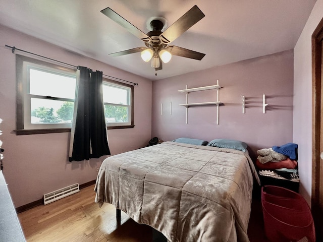 6631 W 89th Pl, Oak Lawn, IL 60453 - bedroom featuring light wood finished floors and ceiling fan