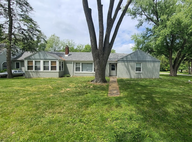 16002 Spaulding Ave, Markham, IL 60428 - view of front of property with a chimney and a front lawn