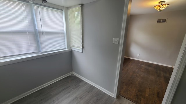 16002 Spaulding Ave, Markham, IL 60428 - corridor featuring dark wood finished floors and baseboards