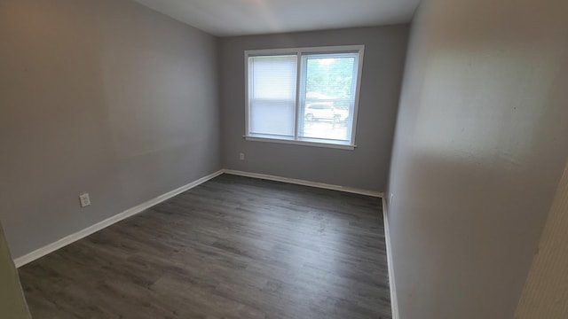 16002 Spaulding Ave, Markham, IL 60428 - unfurnished room with dark wood-type flooring and baseboards