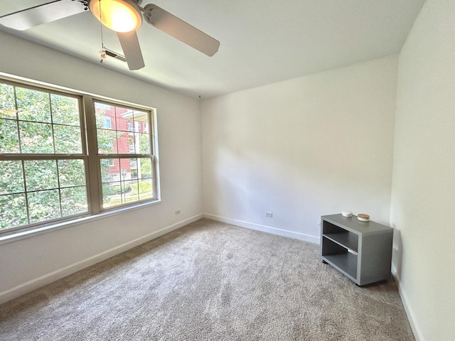 8449 Callie Ave, Morton Grove, IL 60053 - carpeted empty room with baseboards and ceiling fan
