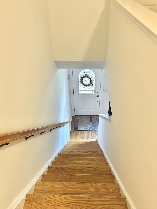 8449 Callie Ave, Morton Grove, IL 60053 - staircase featuring wood finished floors and baseboards