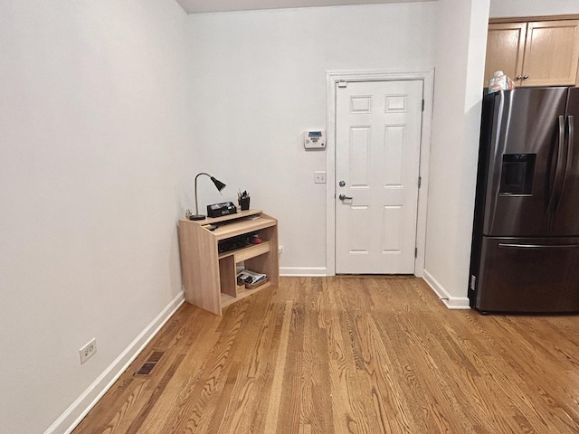 8449 Callie Ave, Morton Grove, IL 60053 - entrance foyer featuring light wood-style floors and baseboards