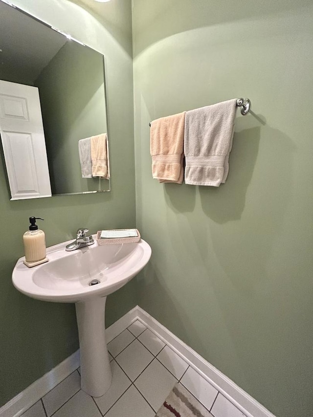 8449 Callie Ave, Morton Grove, IL 60053 - bathroom with baseboards and tile patterned flooring