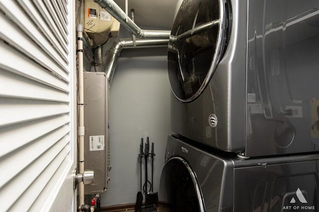 40 Jackson Ln, Streamwood, IL 60107 - laundry room featuring stacked washer / drying machine
