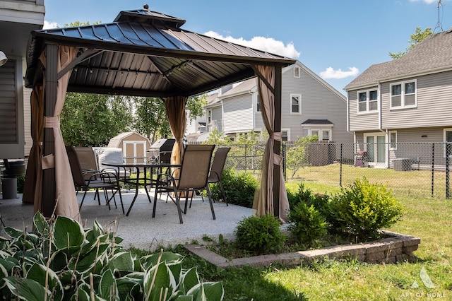 40 Jackson Ln, Streamwood, IL 60107 - view of patio featuring a gazebo, a shed, and area for grilling
