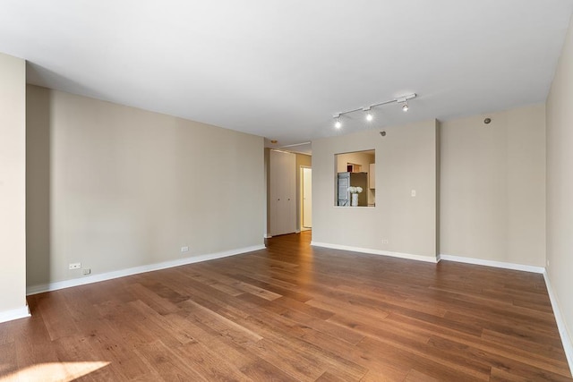 401 E Ontario St Unit 2804, Chicago, IL 60611 - empty room featuring track lighting and wood finished floors