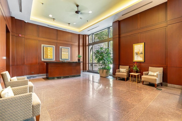 401 E Ontario St Unit 2804, Chicago, IL 60611 - common area featuring a decorative wall, expansive windows, and a towering ceiling