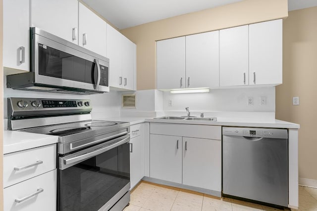 401 E Ontario St Unit 2804, Chicago, IL 60611 - kitchen with stainless steel appliances, light countertops, and white cabinets