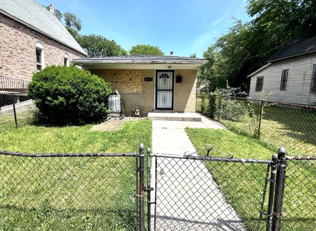 8809 S Harvard Ave, Chicago, IL 60620 - view of front facade with a gate and brick siding