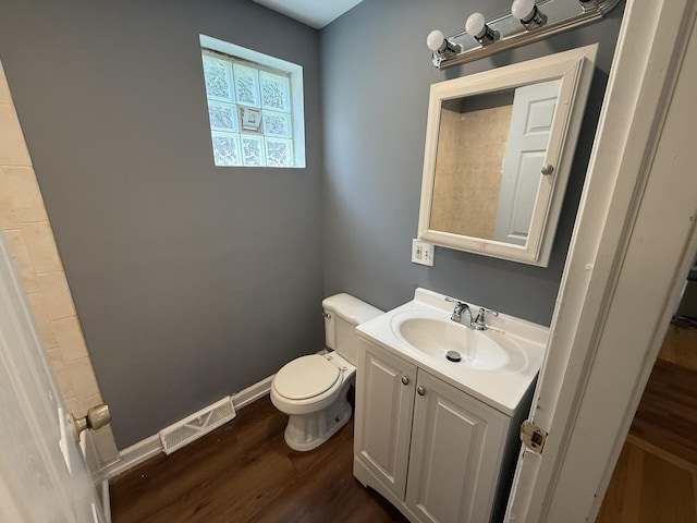 8809 S Harvard Ave, Chicago, IL 60620 - bathroom featuring wood finished floors and vanity