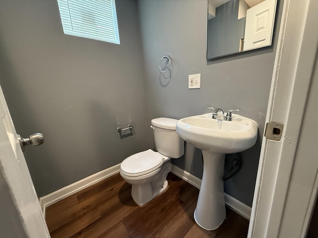 8809 S Harvard Ave, Chicago, IL 60620 - bathroom featuring toilet and wood finished floors