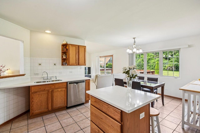 3410 Beckwith Ln, Crete, IL 60417 - kitchen featuring stainless steel dishwasher, brown cabinets, light tile patterned flooring, and open shelves