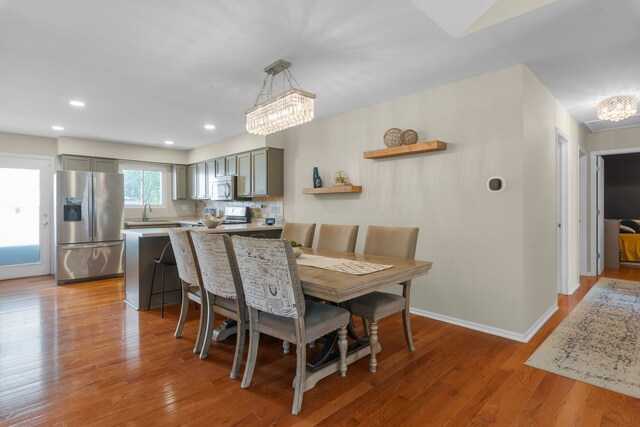 231 E Fullerton Ave, Glendale Heights, IL 60139 - dining room with a chandelier, light wood-style flooring, and recessed lighting