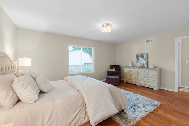 231 E Fullerton Ave, Glendale Heights, IL 60139 - bedroom featuring wood finished floors and baseboards
