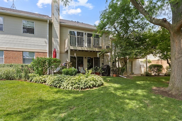 202 Dublin Ln Unit V-1, Schaumburg, IL 60194 - back of property with a lawn and a chimney