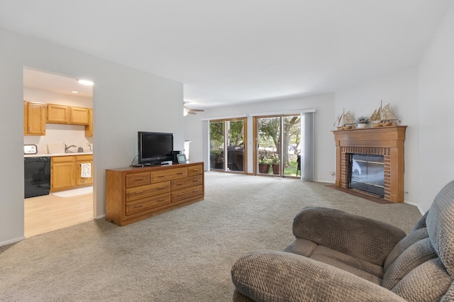 202 Dublin Ln Unit V-1, Schaumburg, IL 60194 - living room with light carpet, a brick fireplace, and a ceiling fan