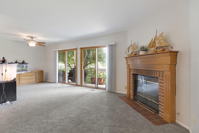 202 Dublin Ln Unit V-1, Schaumburg, IL 60194 - carpeted living area featuring a fireplace and a ceiling fan