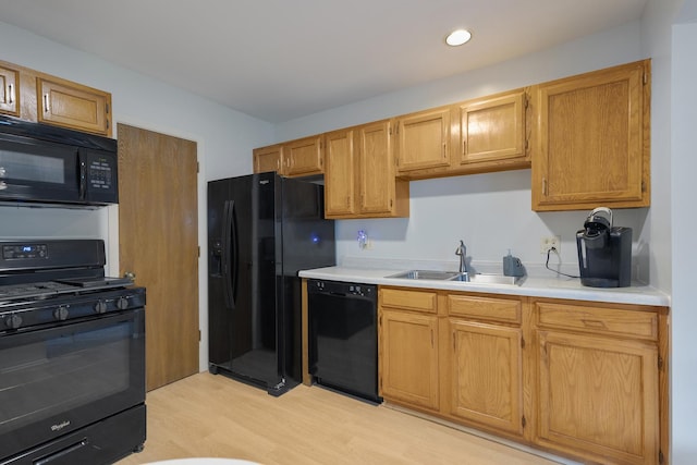 202 Dublin Ln Unit V-1, Schaumburg, IL 60194 - kitchen with black appliances, light countertops, light wood finished floors, and recessed lighting
