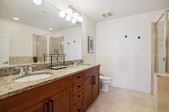 3125 W Fullerton Ave Unit 508, Chicago, IL 60647 - bathroom with a shower stall, double vanity, tile patterned floors, and recessed lighting
