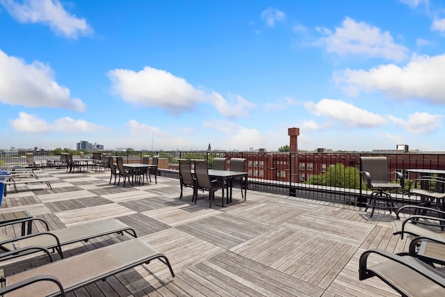 3125 W Fullerton Ave Unit 508, Chicago, IL 60647 - wooden deck featuring outdoor dining space