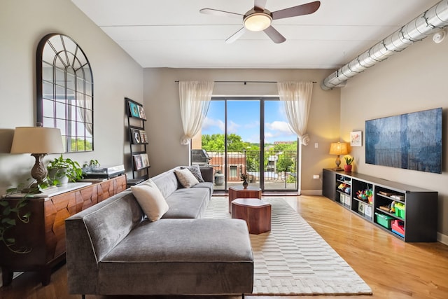 3125 W Fullerton Ave Unit 508, Chicago, IL 60647 - living area with ceiling fan and wood finished floors