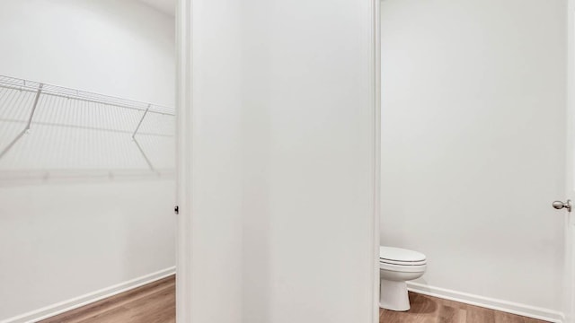 11371 Wildridge Ln, Huntley, IL 60142 - bathroom featuring wood finished floors and toilet