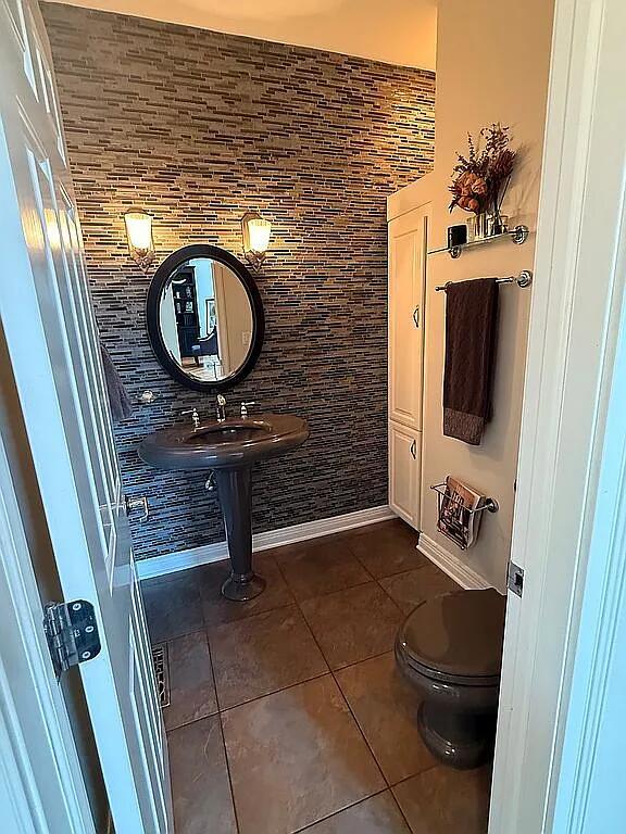 06N274 W Ridgewood Ln, Saint Charles, IL 60175 - half bathroom with tile patterned flooring and toilet