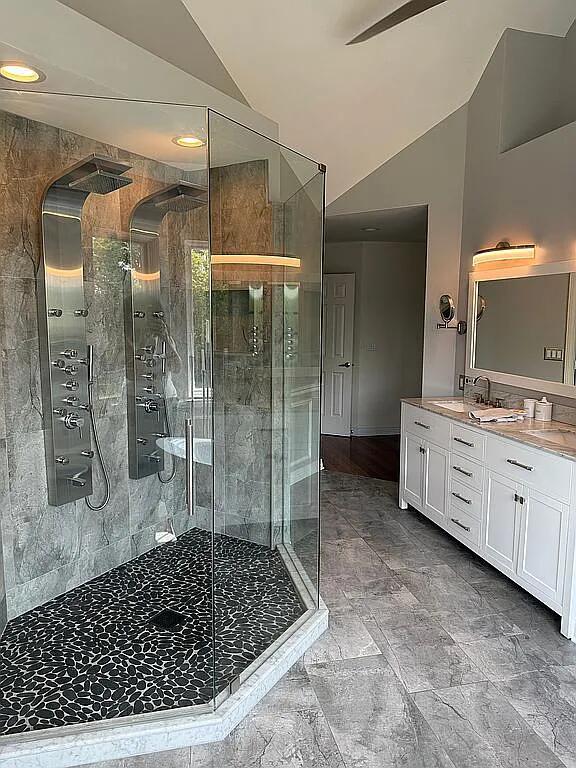 06N274 W Ridgewood Ln, Saint Charles, IL 60175 - full bathroom featuring vaulted ceiling, double vanity, a stall shower, a ceiling fan, and recessed lighting