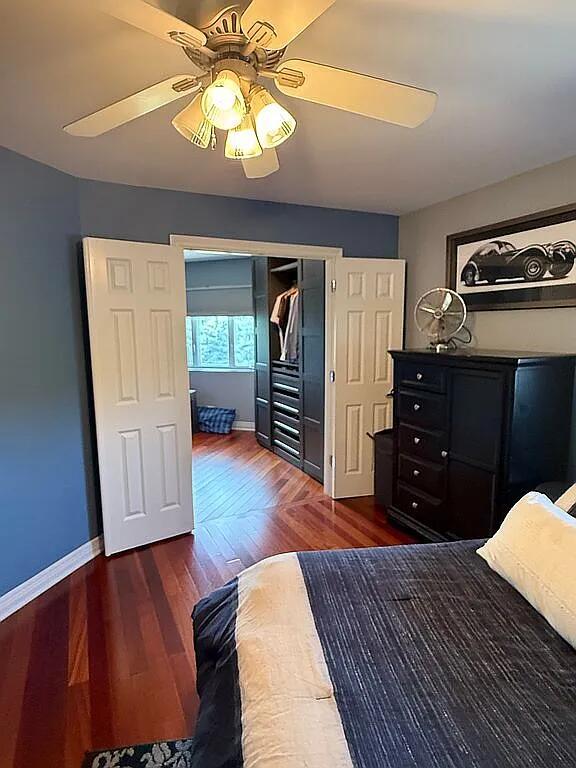 06N274 W Ridgewood Ln, Saint Charles, IL 60175 - bedroom featuring wood finished floors, ceiling fan, and a closet