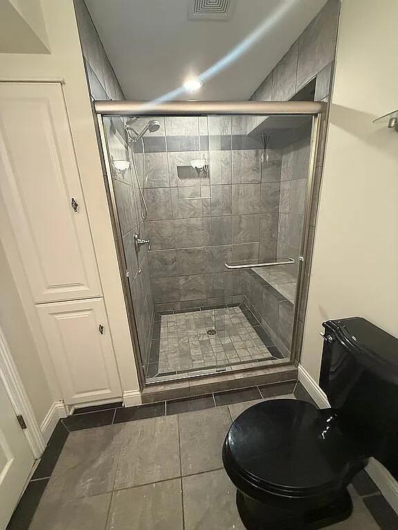 06N274 W Ridgewood Ln, Saint Charles, IL 60175 - bathroom with a stall shower and tile patterned flooring