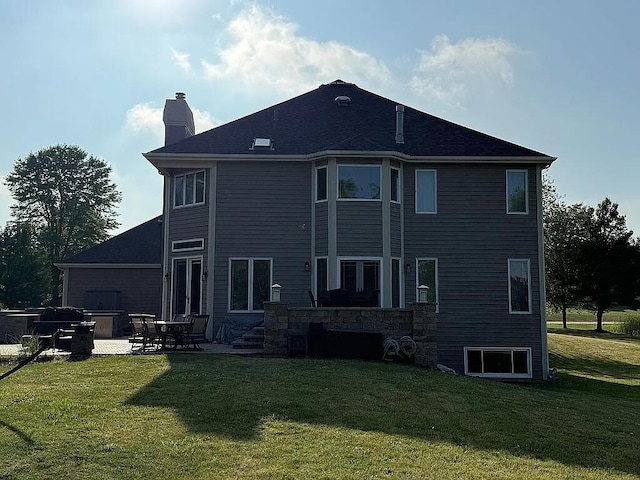 06N274 W Ridgewood Ln, Saint Charles, IL 60175 - rear view of property with a chimney, a yard, and a patio