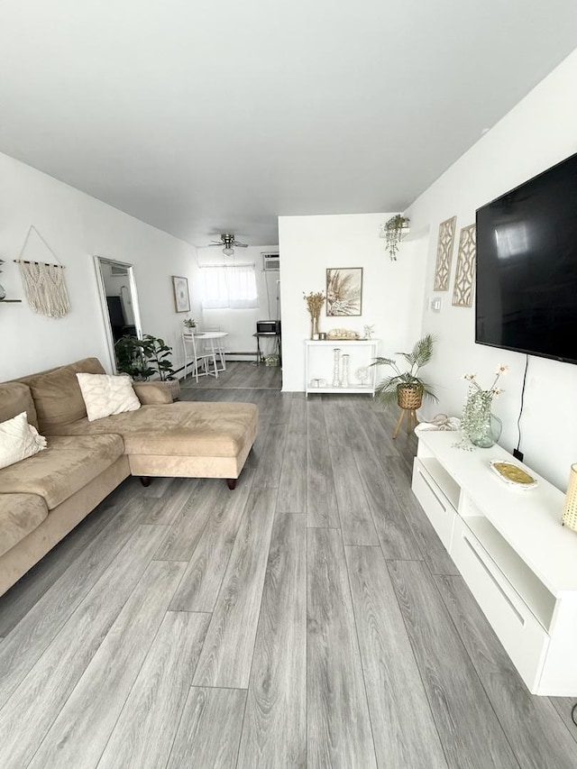 605 N Wolf Rd Unit B9, Hillside, IL 60162 - living area with ceiling fan and wood finished floors