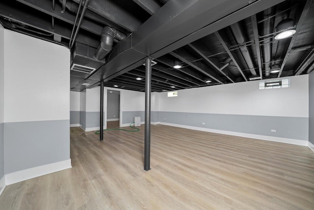 8051 S Paxton Ave, Chicago, IL 60617 - basement with wood finished floors and baseboards