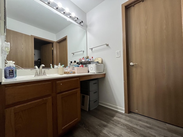 14143 S Napa Cir, Plainfield, IL 60544 - bathroom featuring wood finished floors and vanity