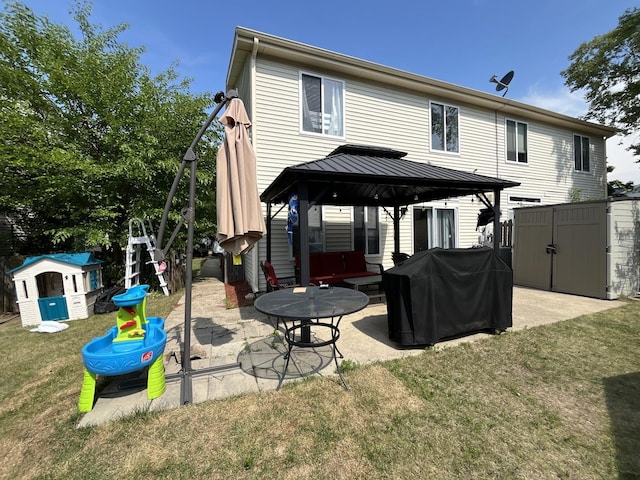 14143 S Napa Cir, Plainfield, IL 60544 - back of house with a storage shed, a gazebo, a patio, and a lawn