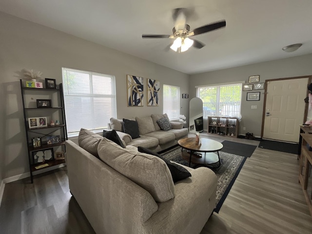 14143 S Napa Cir, Plainfield, IL 60544 - living area with a ceiling fan and dark wood-style flooring