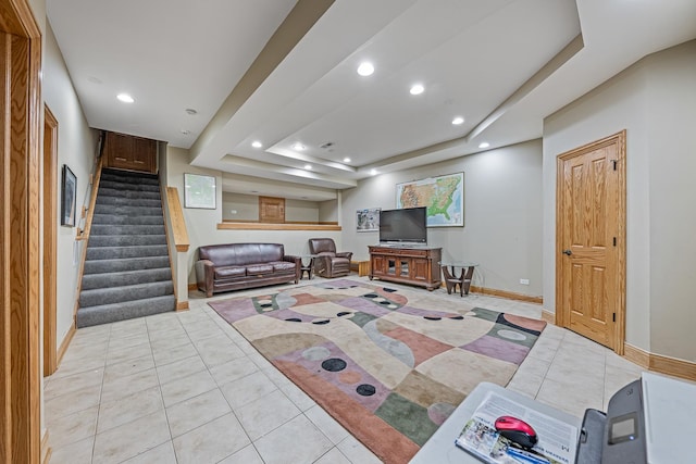 10732 Revere Rd, Mokena, IL 60448 - living room with light tile patterned flooring, a raised ceiling, recessed lighting, and stairway